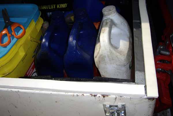 Duct tape and foam insulation around the toolbox lid