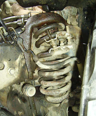 The Ho - Messed up driver's side spring and mount